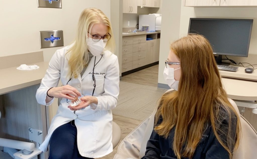 Dr. Christine Bergman at South Lincoln Family Dentistry with at patient.